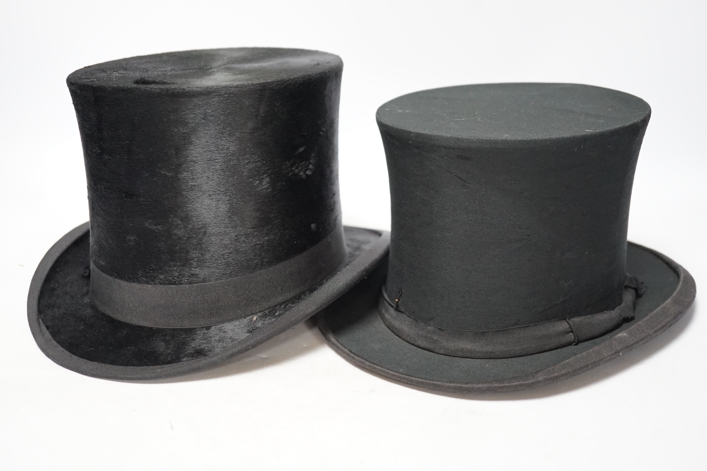 A brown leather top hat case together with a black silk collapsible top hat/opera hat and another, case 25cm high